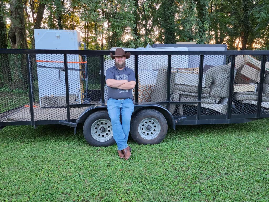 Rodeo Junk Removal crew and truck ready for a junk removal appointment