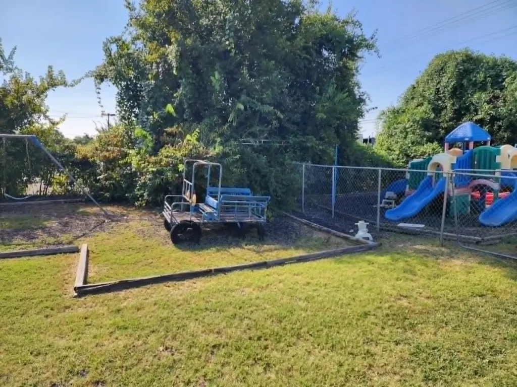 Before photo of a commercial playset removal at a daycare in Smyrna, TN
