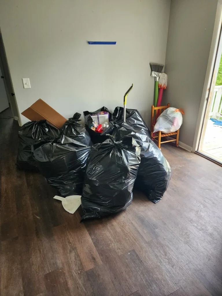 Before photo of a foreclosure cleanout dining room in Pulaski, TN