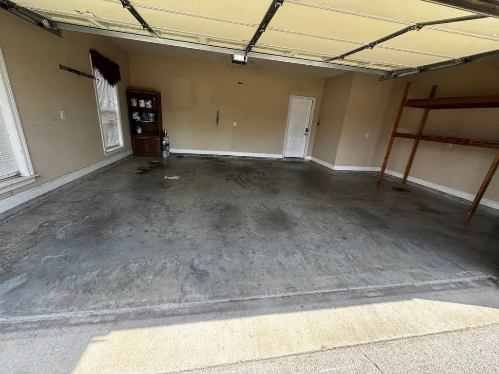 After photo of a garage cleanout in Spring Hill, TN showing the garage cleared out
