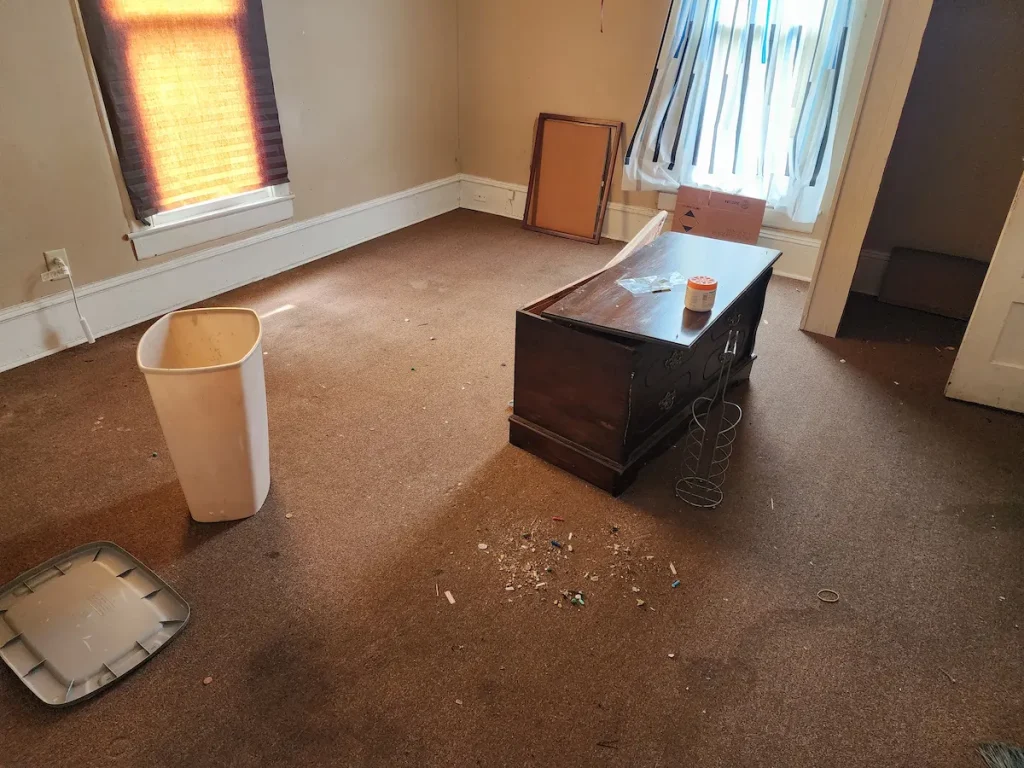 Before photo of another area of a Lewisburg rental property before cleanout
