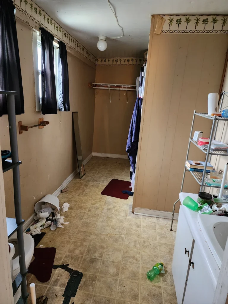 Before photo of a Lewisburg rental property cleanup with unwanted items before removal