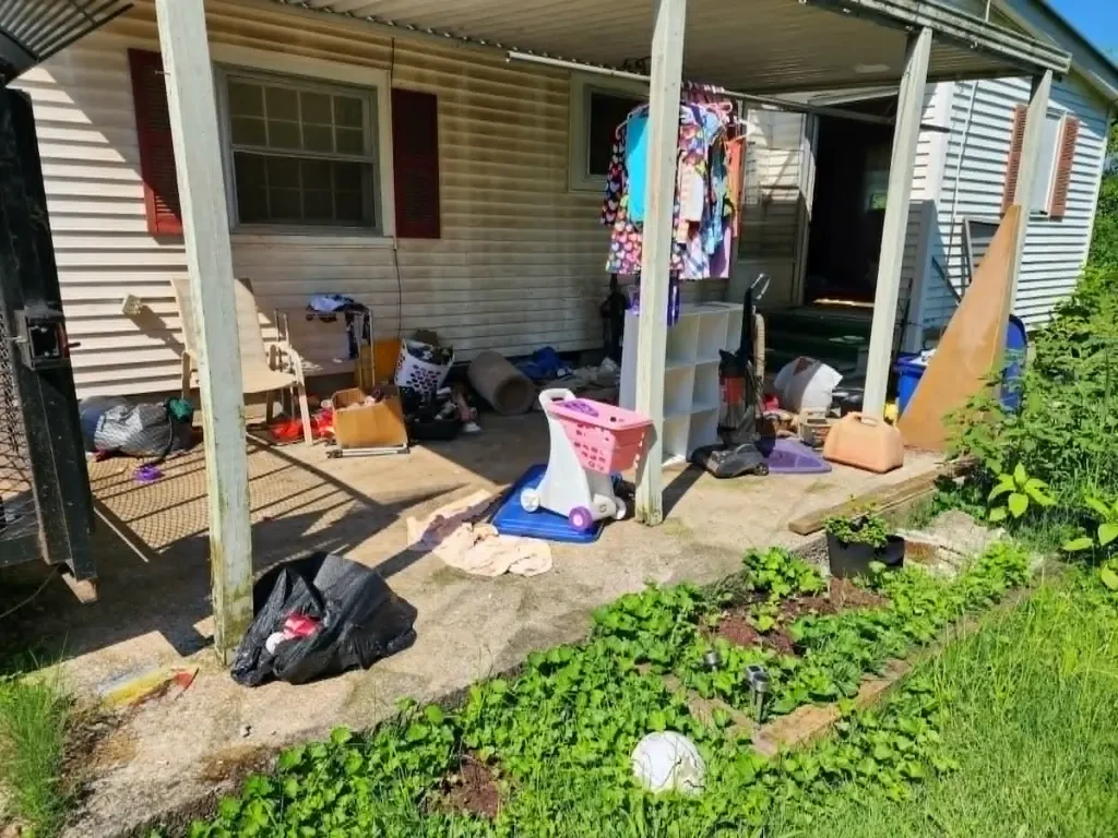 Before: Rental property before cleanout in Manchester, TN