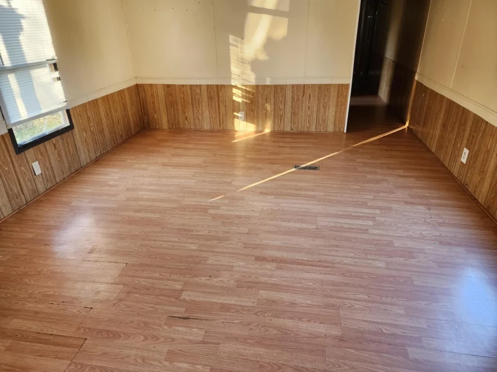 After photo of a rental property living room cleanout in Tullahoma, TN showing the area cleared