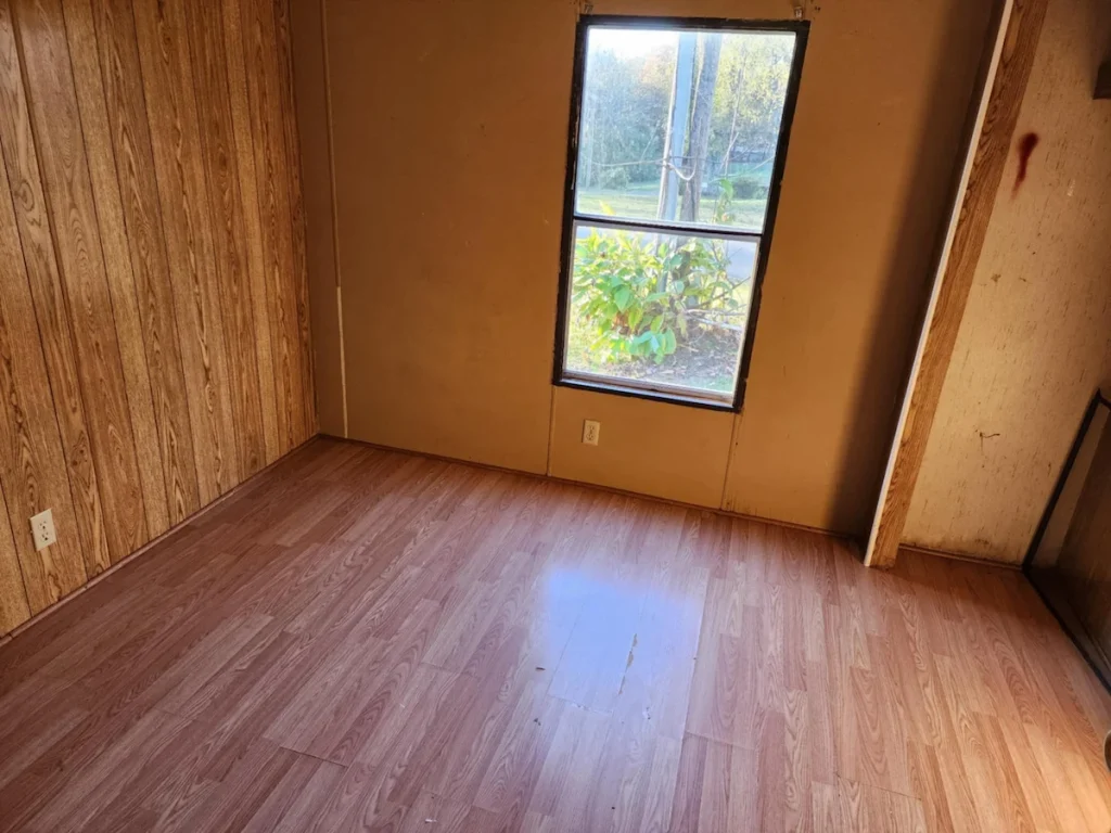 After photo of a rental property bedroom cleanout in Tullahoma, TN showing the room cleared