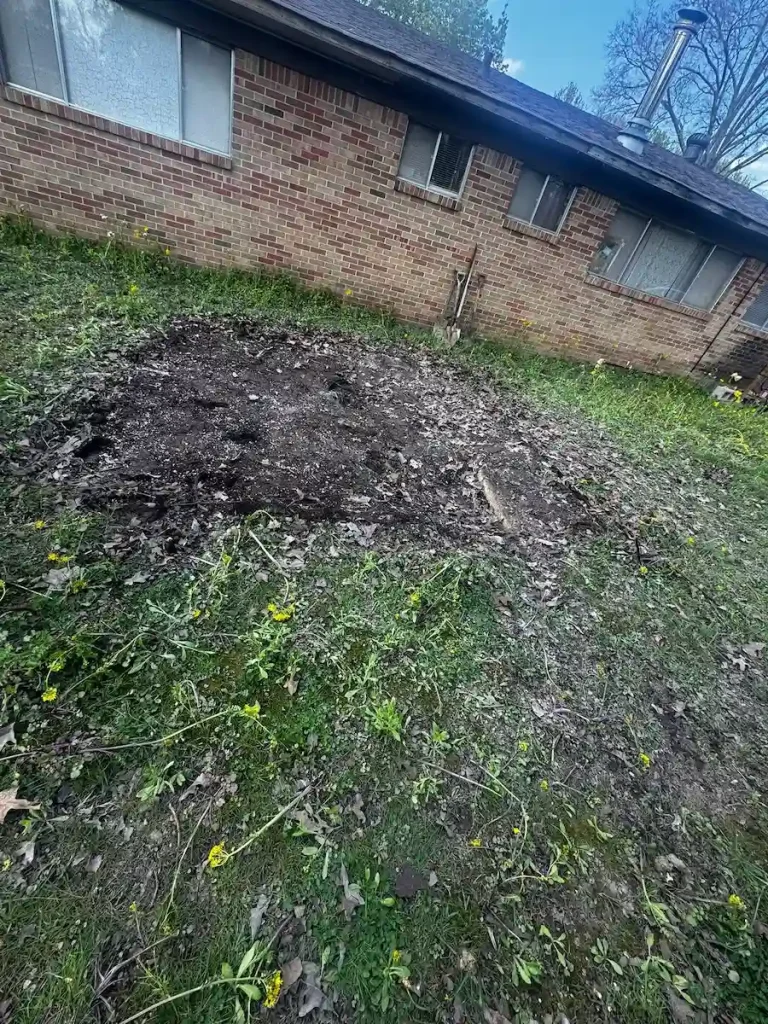 After photo of a shed removal in Manchester, TN showing the yard area cleared