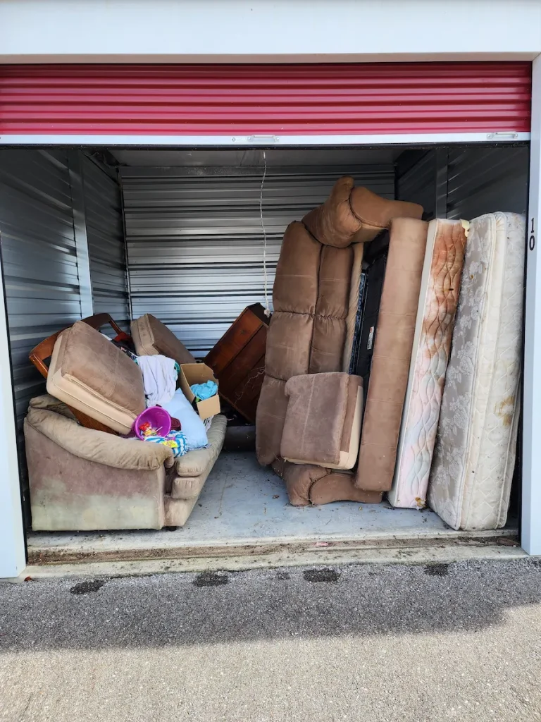 Before photo of a storage unit cleanout in Pulaski, TN with items before removal