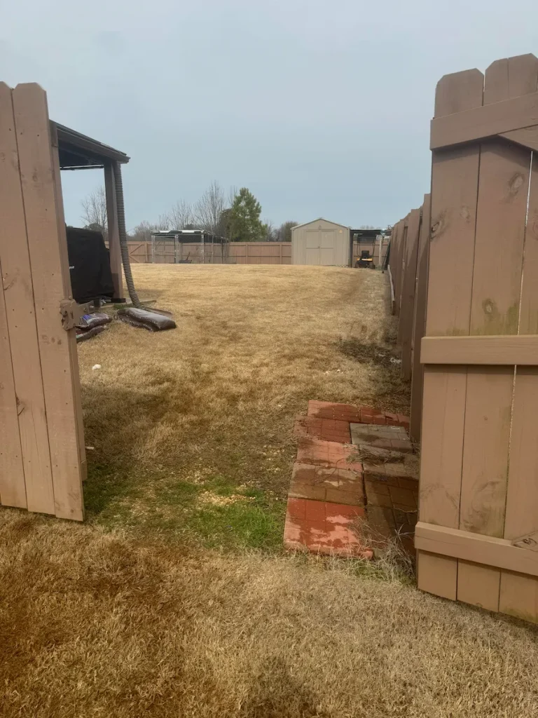 After photo of backyard junk removal in Ardmore, AL showing the area cleared