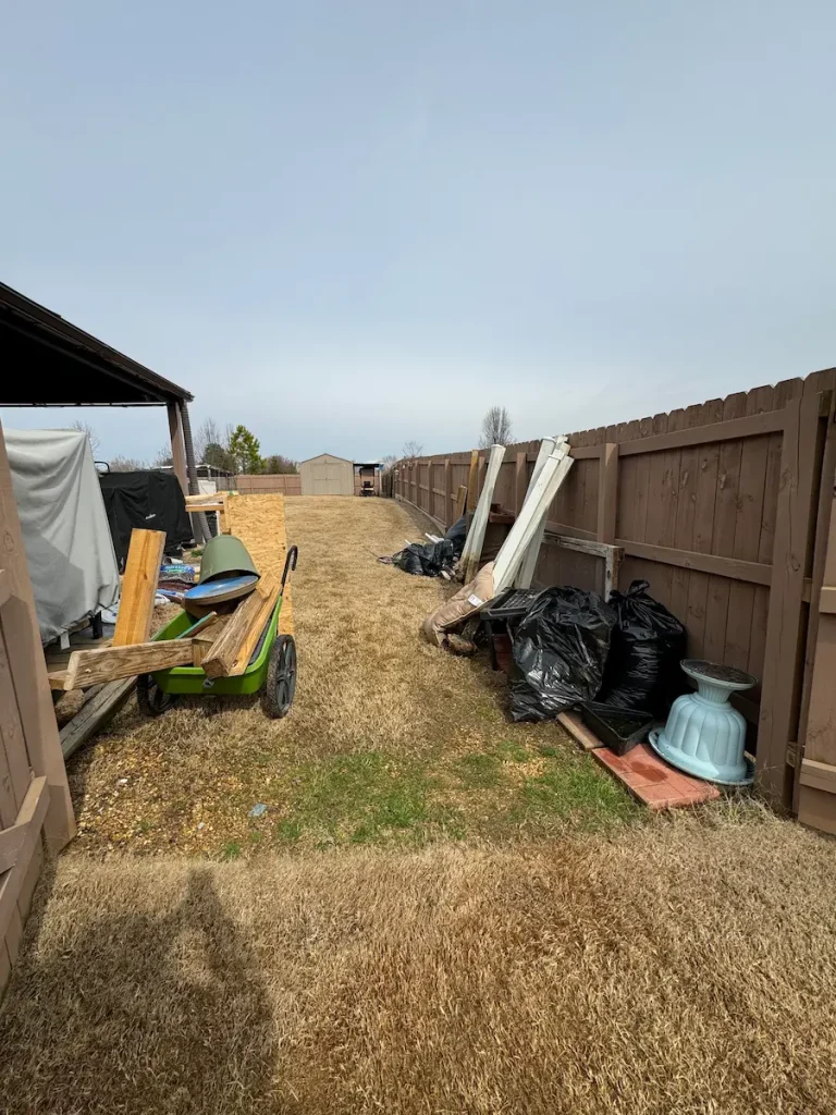 Before photo of backyard junk removal in Ardmore, AL