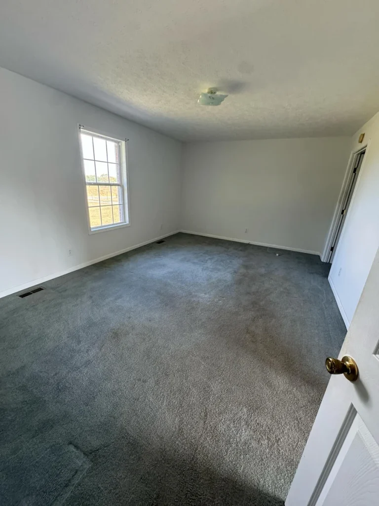After photo of an estate cleanout bedroom in Shelbyville, TN showing the room cleared