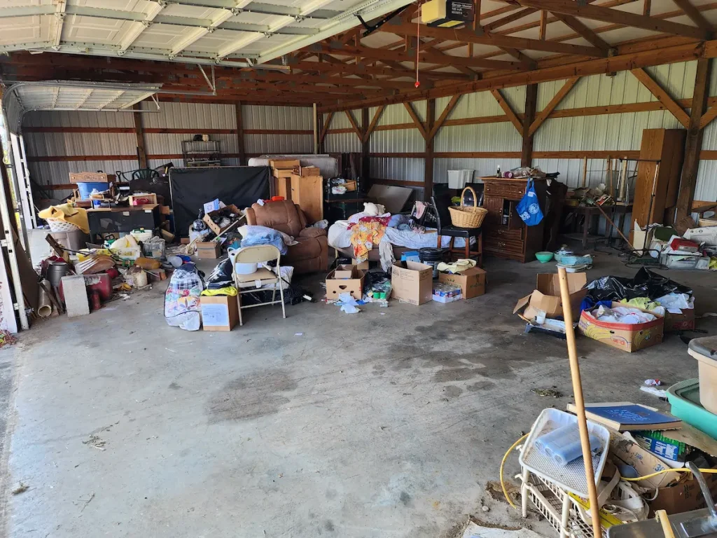Before photo of another shop area during an estate cleanout in Shelbyville, TN