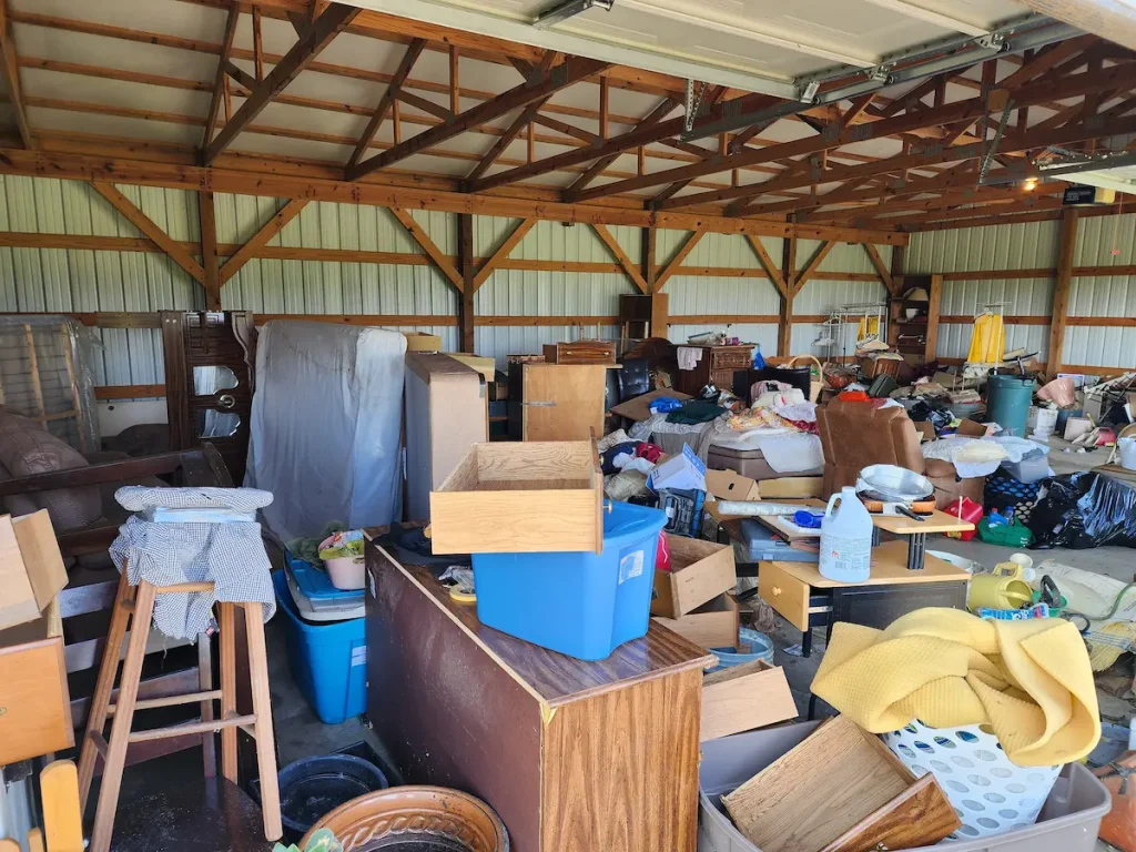 Before photo of an estate shop cleanout in Shelbyville, TN with stored items before removal
