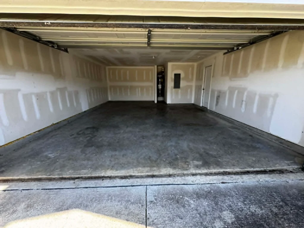 After photo of a foreclosure garage cleanout in Columbia, TN showing the garage cleared