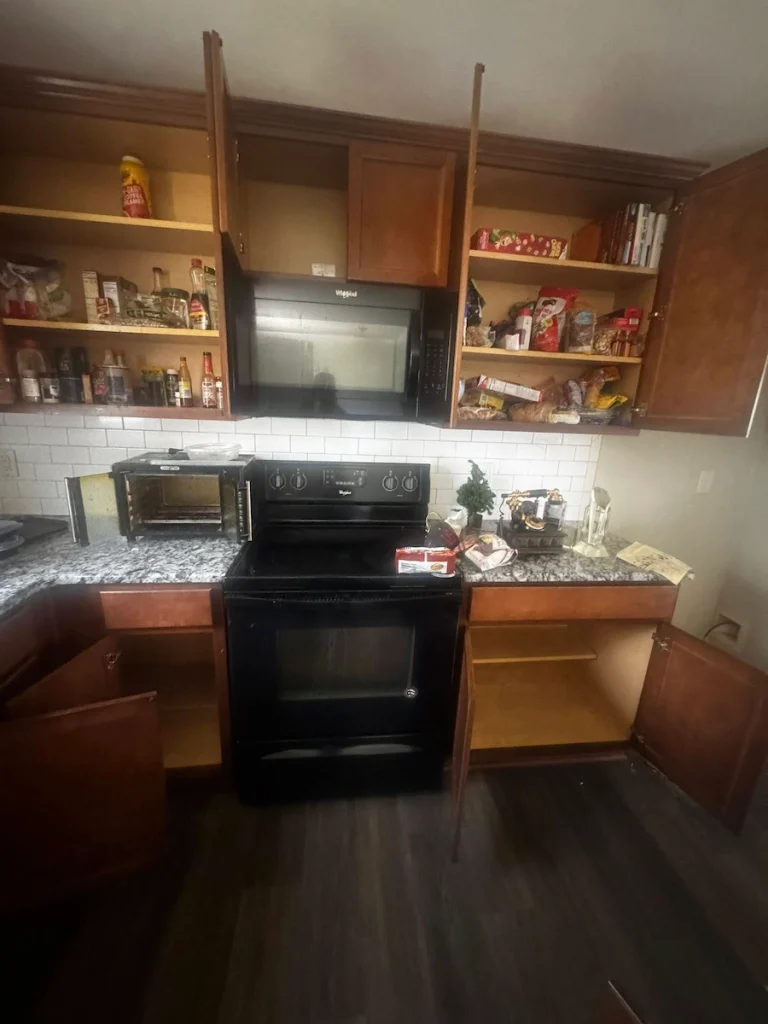 Before photo of another kitchen area during a foreclosure cleanout in Columbia, TN