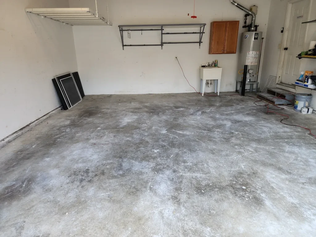 After photo of a garage construction debris cleanout in Franklin, TN showing the garage cleared