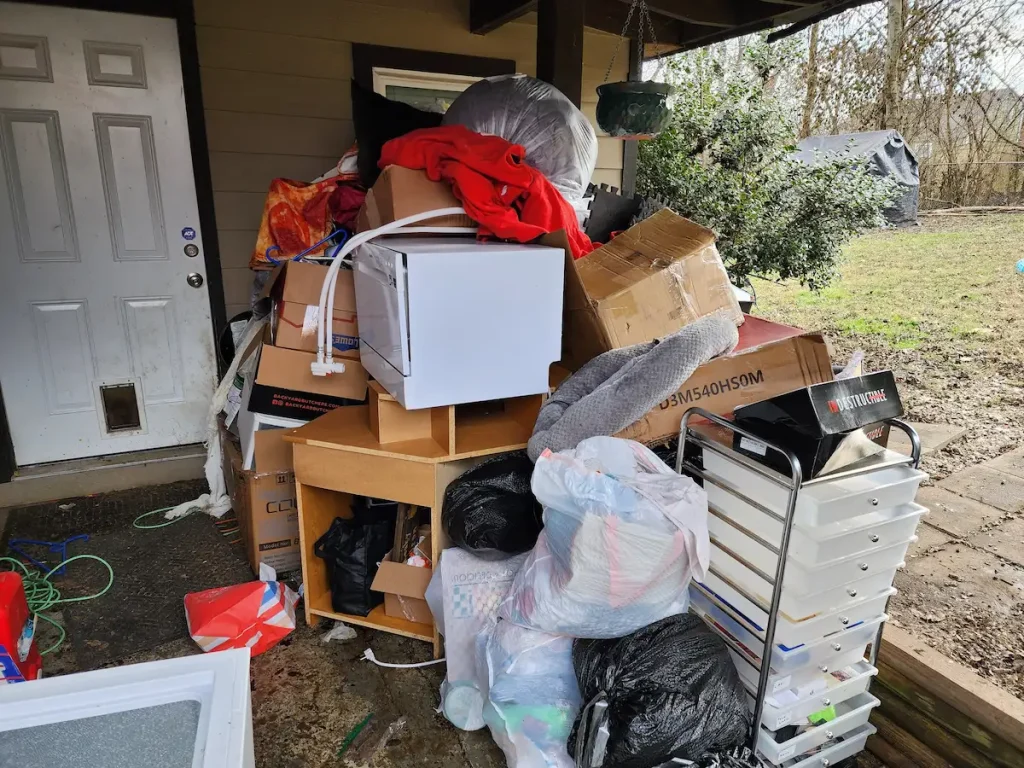 Before photo of a back porch junk removal job in Nashville, TN