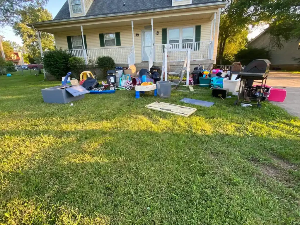 Before: Move-out junk staged outside before pickup