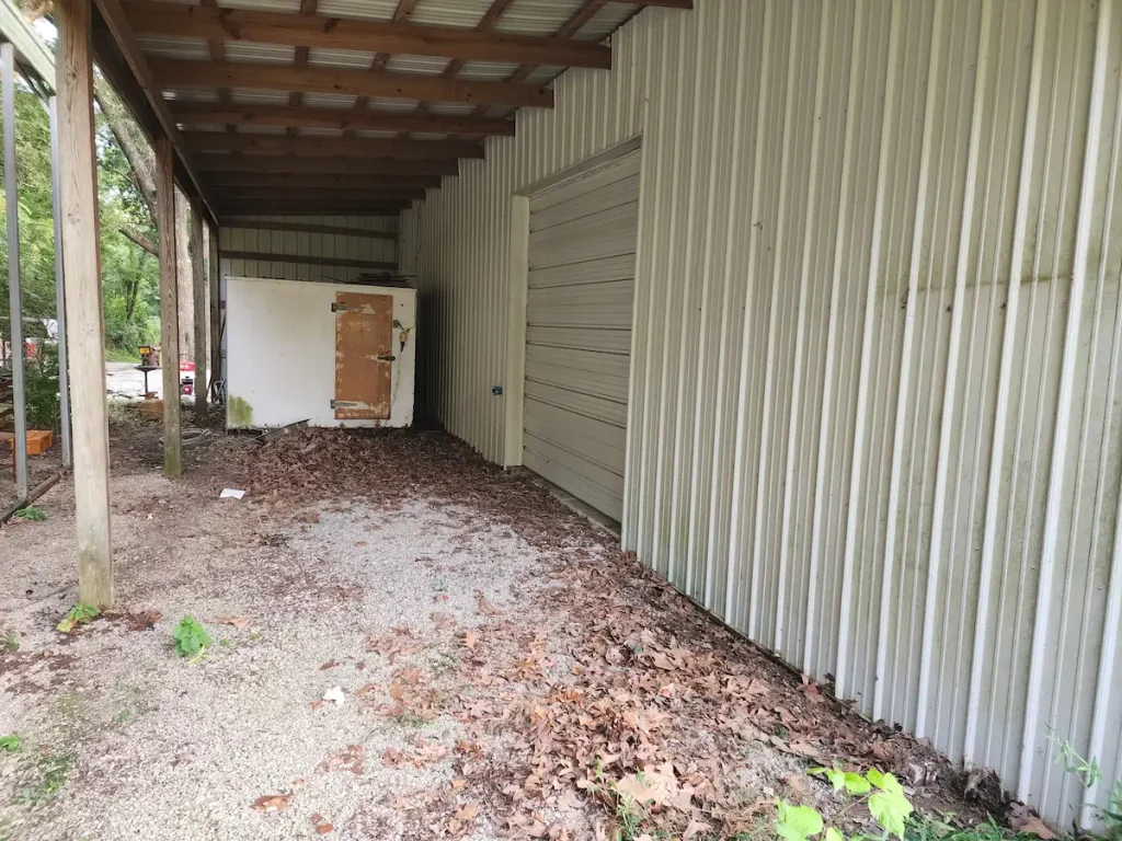 After photo of a shop cleanout in Summertown, TN showing the shop area cleared