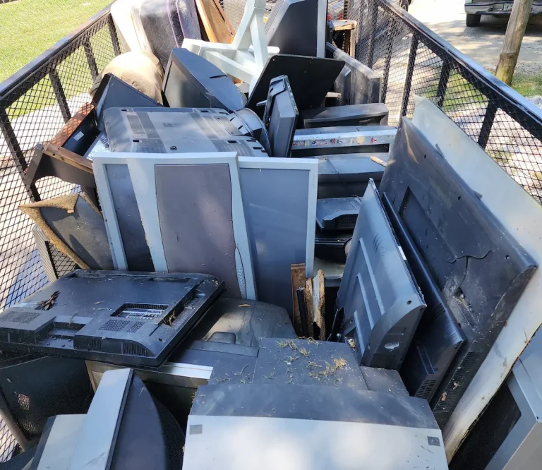 Trailer loaded with old TVs and electronics for removal and recycling in Murfreesboro, TN